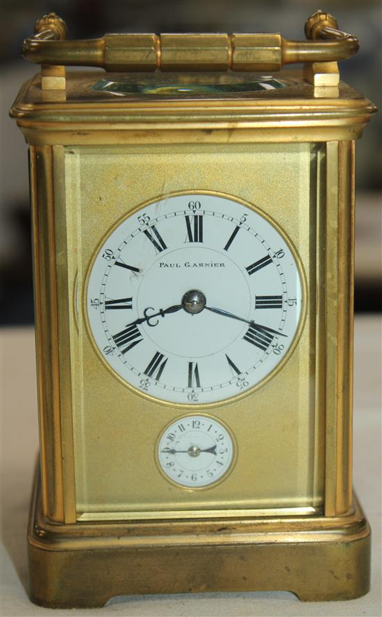 A 19th century gilt brass carriage alarum clock, 5in., with travelling case